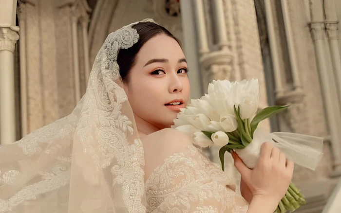 Nhật Kim Anh công khai ảnh mặc váy cưới, nói thẳng về danh tính chú rể